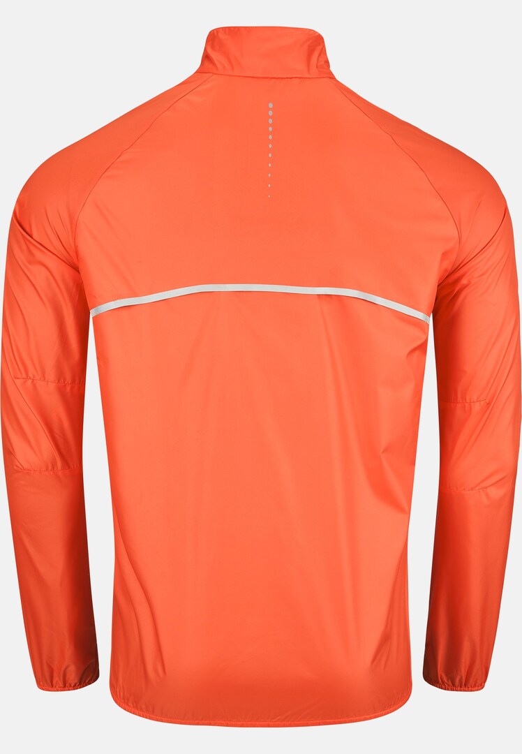 The Zeroweight running jacket in firelight | High
