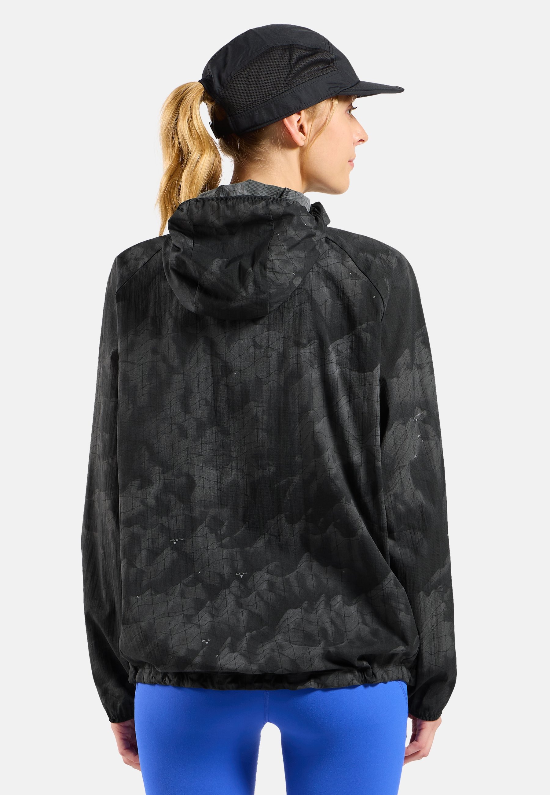 The Zeroweight hyper print hooded running anorak in black