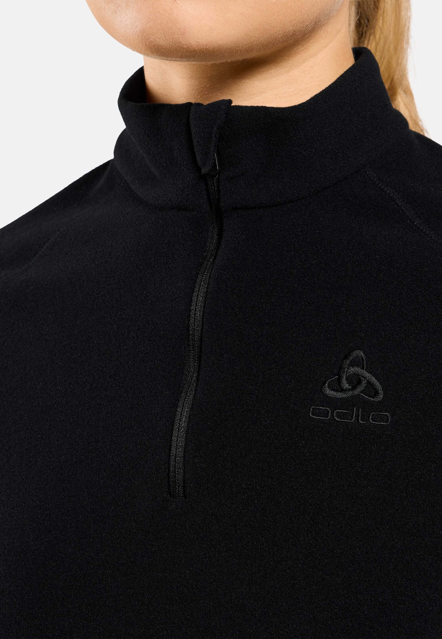 Mid layer Rigi con mezza zip