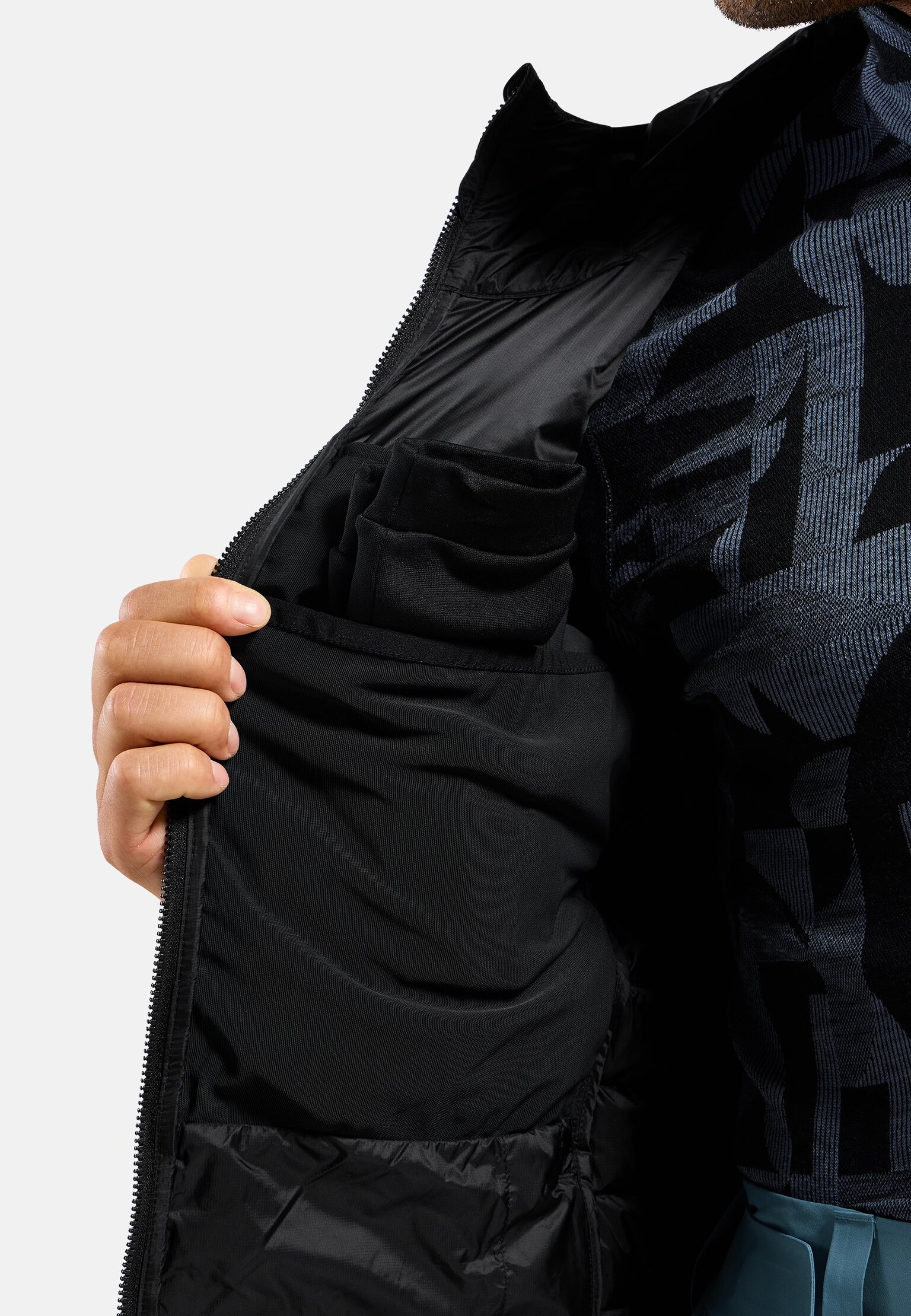 Kompakte X-Alp Daunenjacke mit Kapuze