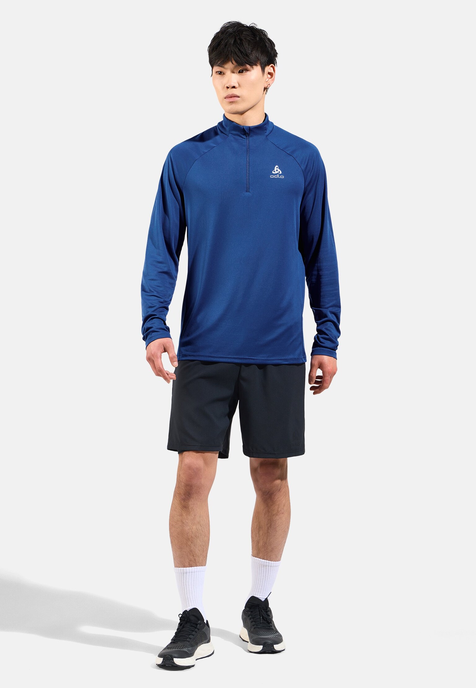 The men's Essentials half-zip running mid layer